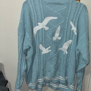 Oversized Blue Sweater with Bird Design